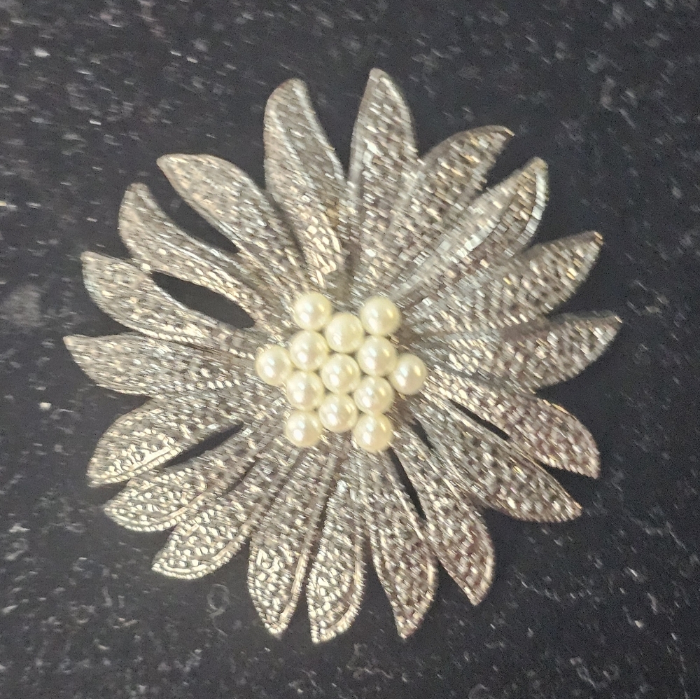 vintage-inspired floral sunburst brooch